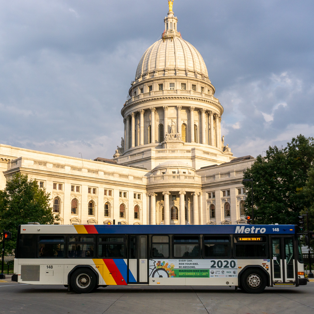 The Madison Bikes bus in front of the Wisconsin State Capitol
